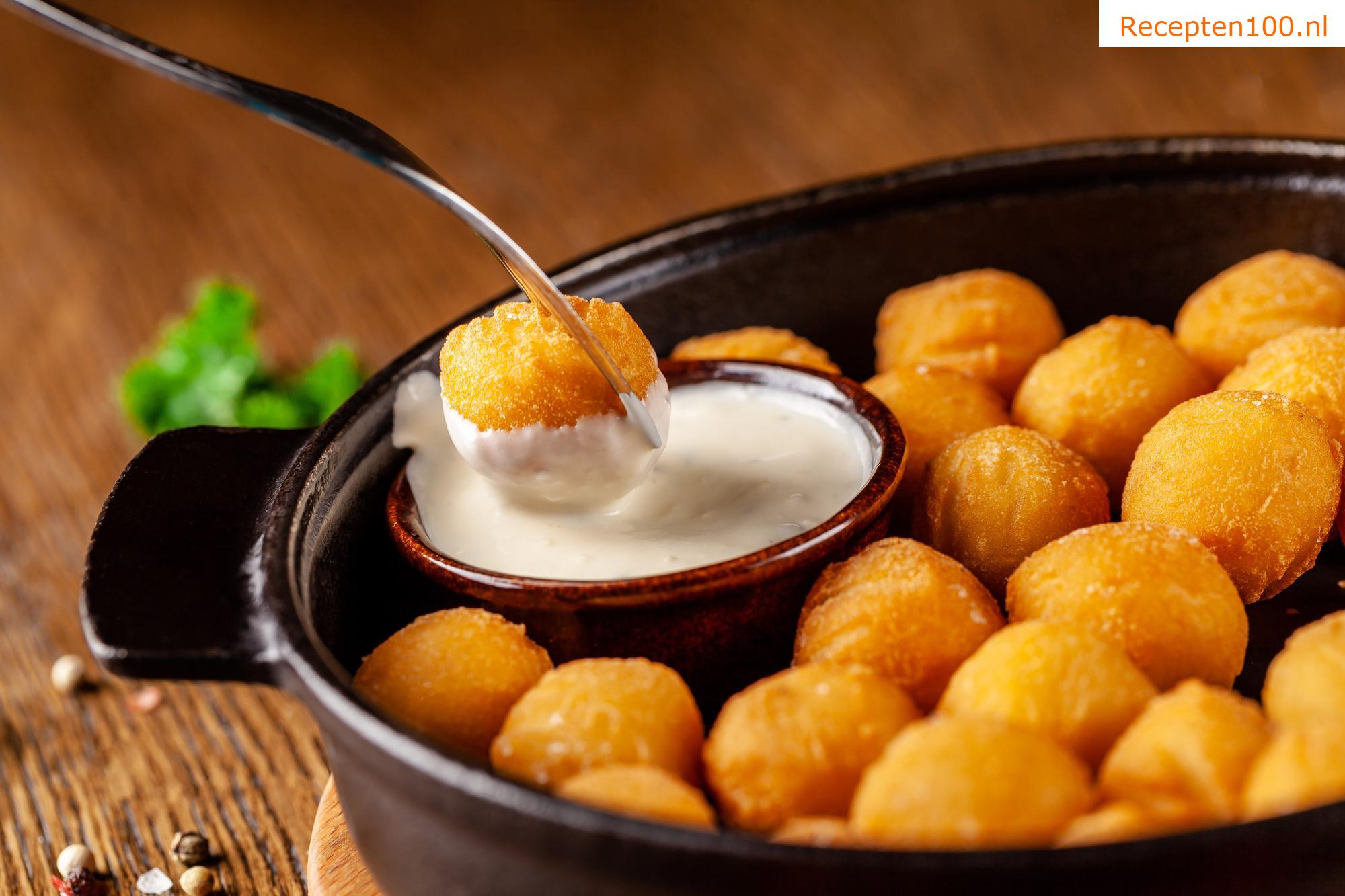 Aardappelpuree kroketten met gefruite ui en kaas