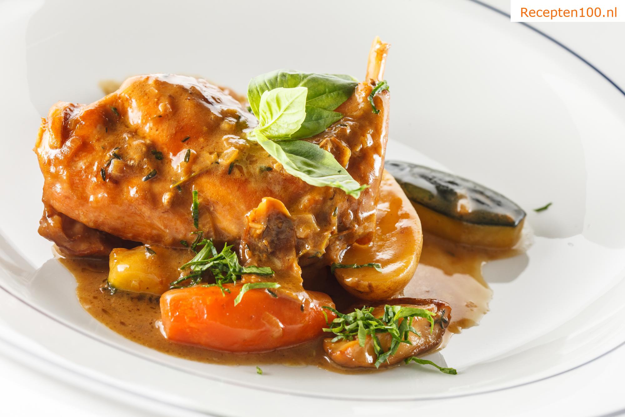 Gekonfijte konijn met spek, knoflook en verse champignons