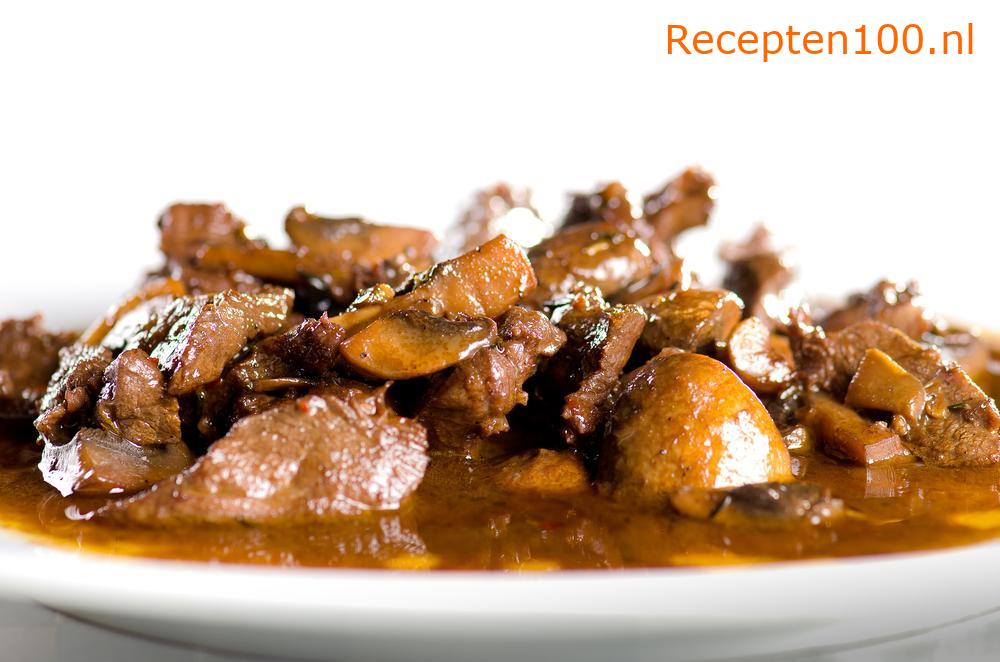 Varkensvlees met champignons en rijst